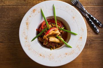 Sauteed Chicken Breast with Vegetables. View from above, top studio shot