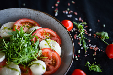 italian caprese salad with fresh mozzarella, tomatoes & basil