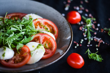italian caprese salad with fresh mozzarella, tomatoes & basil