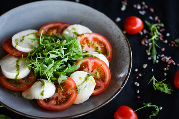 italian caprese salad with fresh mozzarella, tomatoes & basil
