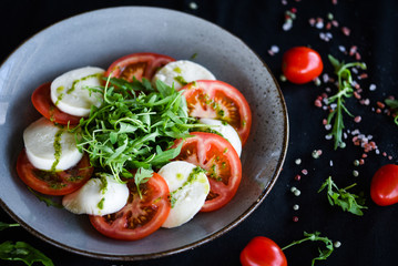 italian caprese salad with fresh mozzarella, tomatoes & basil