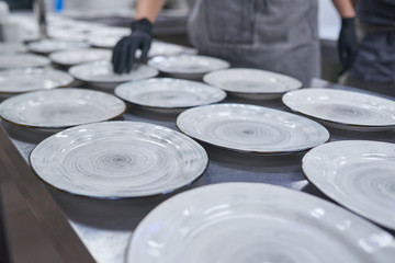 Lots of empty plates on the table