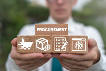 Man arranging wooden blocks with supply chain and retail logistics icons. Procurement Management...