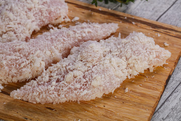 Raw chicken cutlet