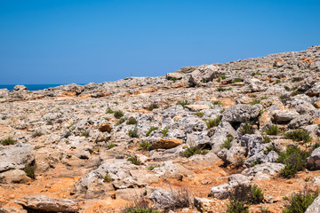 Fototapeta na wymiar Rough coastline of Comino island, Malta