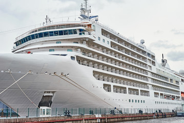 White cruis ship liner docked in the port