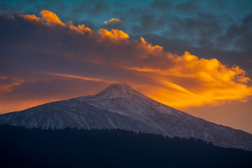Fototapeta premium Amazing sunset with orange clouds at Teide National Park in Tenerife Canary Islands Spain