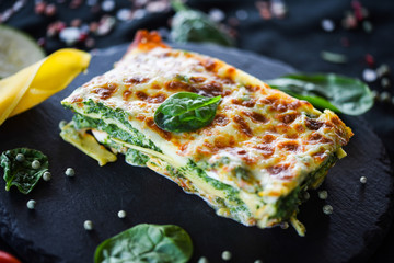 italian lasagna slice with fresh ingredients - obrazy, fototapety, plakaty