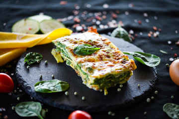italian lasagna slice with fresh ingredients