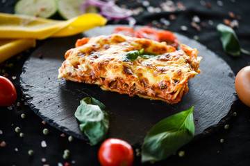 italian lasagna slice with fresh ingredients