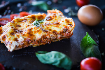 italian lasagna slice with fresh ingredients
