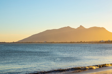 sunset at boca da barra beach, in rio das ostras, rio de janeiro, brazil