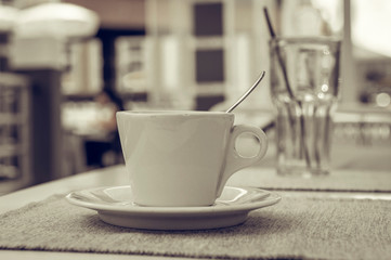 cup with coffee on the table