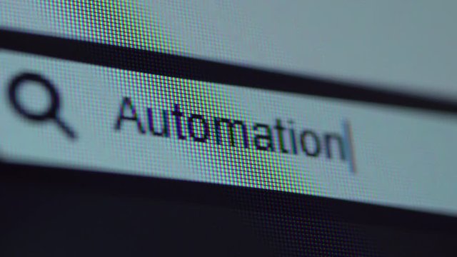 Browser bar with typed Automation text on the computer screen. Shot in 4k resolution