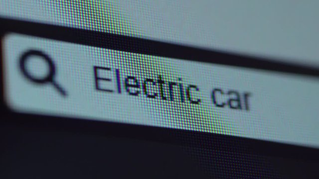 Browser car with typed Electric Car text on the computer screen. Search Engine Concept. Shot in 4k resolution