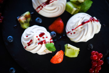 delicious pavlova sweet with fresh fruits