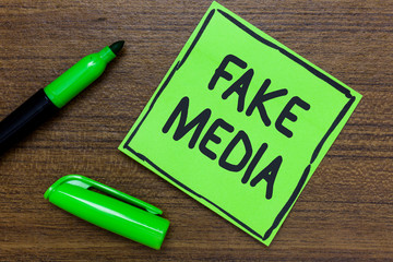 Conceptual hand writing showing Fake Media. Business photo showcasing An formation held by...