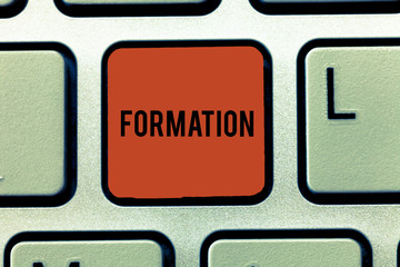 Word writing text Formation. Business concept for action of forming or process of being formed especially sport Keyboard key Intention to create computer message, pressing keypad idea