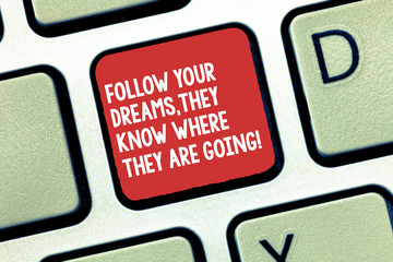 Conceptual hand writing showing Follow Your Dreams They Know Where They Are Going. Business photo...