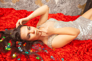 Naklejka premium fashion style portrait of a sensual woman in silver glitter dress