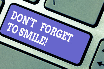 Word writing text Don T Forget To Smile. Business concept for Be always cheerful smiley spread and show happiness Keyboard key Intention to create computer message pressing keypad idea