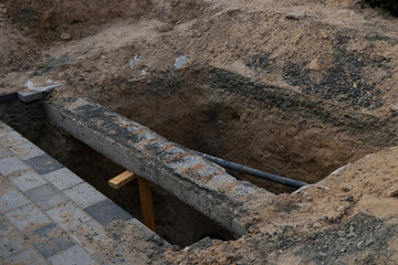 deep excavation near the foot path, part of construction work