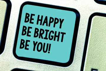 Fototapeta premium Handwriting text writing Be Happy Be Bright Be You. Concept meaning Selfconfidence good attitude enjoy cheerful Keyboard key Intention to create computer message pressing keypad idea