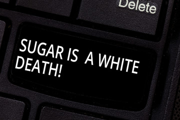 Handwriting text Sugar Is A White Death. Concept meaning Sweets are dangerous diabetes alert unhealthy foods Keyboard key Intention to create computer message pressing keypad idea