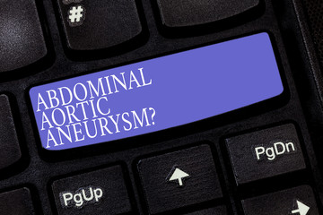 Handwriting text Abdominal Aortic Aneurysmquestion. Concept meaning getting to know the enlargement of aorta Keyboard key Intention to create computer message pressing keypad idea