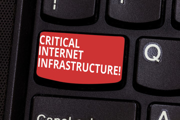 Text sign showing Critical Internet Infrastructure. Conceptual photo essential components of internet operation Keyboard key Intention to create computer message pressing keypad idea