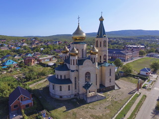 Fototapeta na wymiar Trinity Church, the village of Goryachy Klyuch, Krasnodar Krai, Russia