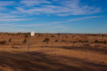 Fototapeta na wymiar Basketball hoop in the middle of a desert near Amarillo, Texas.