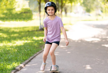 Little skates on one leg. In a helmet.