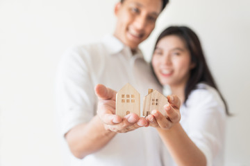Happy couple starting new life and moving to new house