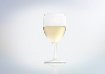 White wine in a glass isolated on white background.