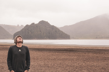 man looking at the sea