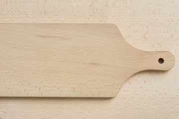 cutting board on wooden background texture