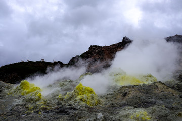 Iozan hissing mountains in Hokkaido, with sulphur and smoke