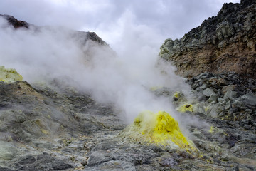 Iozan hissing mountains in Hokkaido, with sulphur and smoke
