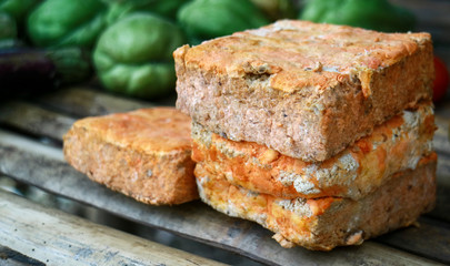 Red oncom. Oncom is one of the traditional staple foods of West Javan (Sundanese) cuisine of Indonesia. 