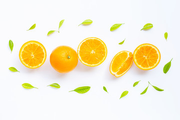 Fototapeta na wymiar High vitamin C, Juicy and sweet. Fresh orange fruit with green leaves on white.
