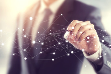 Businessman hand touching map point, network connection, international meaning, cloud media network interface concept.