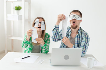 Upset husband and wife in shock from numerous checks for payments and purchases made per month....