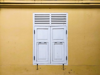 Vintage window on old public building