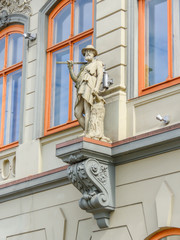 Obraz premium sculpture on the wall of a building in Riga