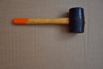 rubber mallet on cardboard box