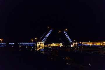 Fototapeta na wymiar Opening bridges in St. Petersburg at night in Russia