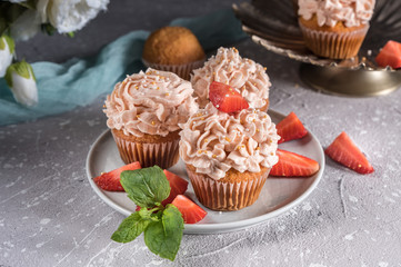 Homemade tasty cupcakes with fresh berries