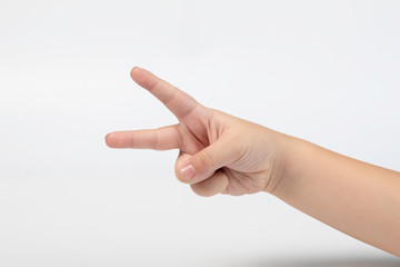 Selective focus hand of little Asian boy and fingers symbols in one two victory thum up and begging...