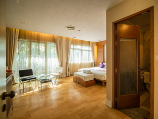 Luxury bedroom with warm light of hotel resort,